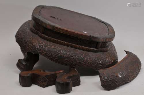 Carved wooden stand. Japan. Surface carved with pine trees and auspicious emblems. Engraved copper mounts. 14