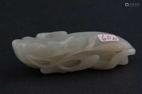Jade animal. China. 18th century. Litchee white jade. Carving of a water buffalo with a stalk of grain in its mouth. 3