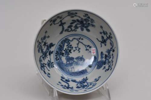 Porcelain bowl. China. Circa 1900. Interior decorated with sheep and flowering trees. Exterior with a monochrome grey colour. Kuang Hsu mark on the base. 5-7/8