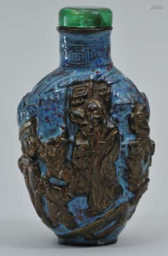 Snuff bottle. China. 19th century. Porcelain made to look like an ancient patinated bronze with a scene of women and children. Chips. 2-3/4