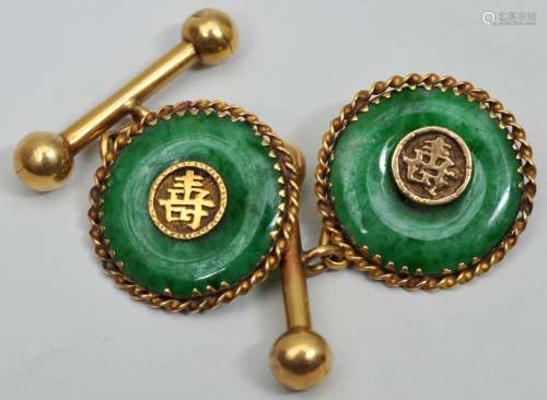 Pair of cufflinks. Bright green Jadeite disk set in high carat gold.