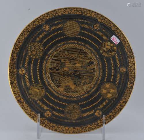 Komai plate. Japan. Meiji period (1868-1912). Iron inlaid with gold and silver. Scene of a temple complex and various brocade patterns. 7