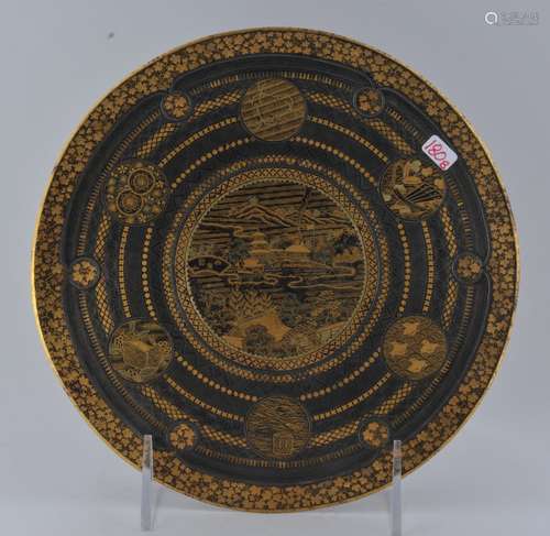 Komai plate. Japan. Meiji period (1868-1912). Iron inlaid with gold and silver. Scene of a temple complex and various brocade patterns. 7