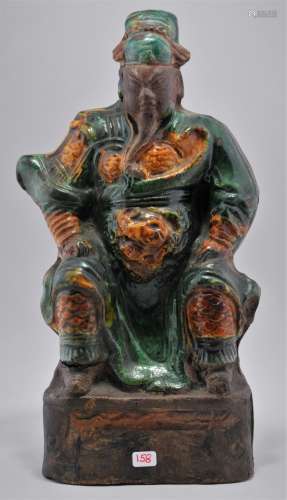 Stoneware figure. China. Ming period (1368-1644). San Tsai glazed figure of The God of War Kuan Ti. 10