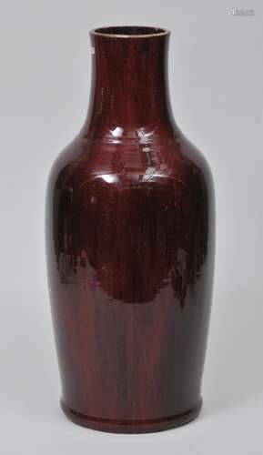 Large porcelain vase. China. Late 19th century Lang Yao ware with a deep purple red glaze. Truncated. 21-1/2