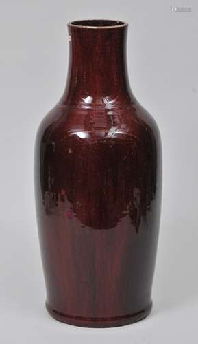 Large porcelain vase. China. Late 19th century Lang Yao ware with a deep purple red glaze. Truncated. 21-1/2