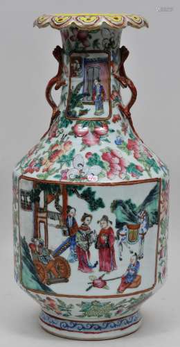 Porcelain vase. China. 19th century. Foliate edge red kylin handles. Famille Rose reserves of figures in a garden. Butterfly and flower borders. 17-1/4