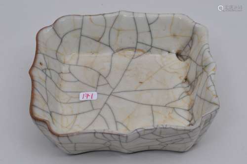 Porcelain square dish. China. 20th century. Foliated sides. Thick white crackled glaze. 5