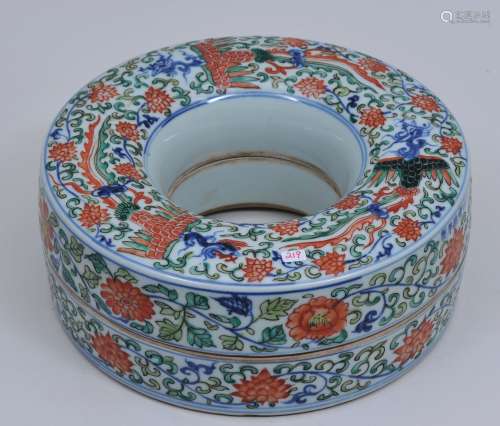 Porcelain box. China. 20th century. Ring shaped. Wu Tsai decoration of phoenixes and lotus scrolling. Hsuan Te mark. 10