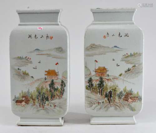 Pair of porcelain vases. China. Republic Period. Rectangular section. Enamel decoration of a landscape with a fortification. 12