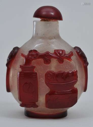 Snuff bottle. China. 19th century. Overlay red cut to snowflake with various seals. 2-1/4