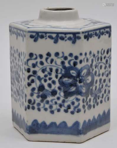 Porcelain tea caddy. China. 19th century. Hexagonal form. Underglaze blue decoration of floral scrolling. 5-1/4