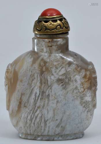 Snuff bottle. China. 19th century. Grey and white agate. Coral and brass stopper. 2-1/2