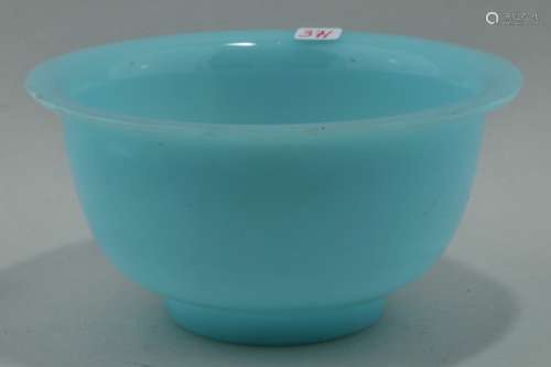 Peking glass bowl. China. Late 19th century to early 20th century. Highly translucent pale blue colour. 4-3/4