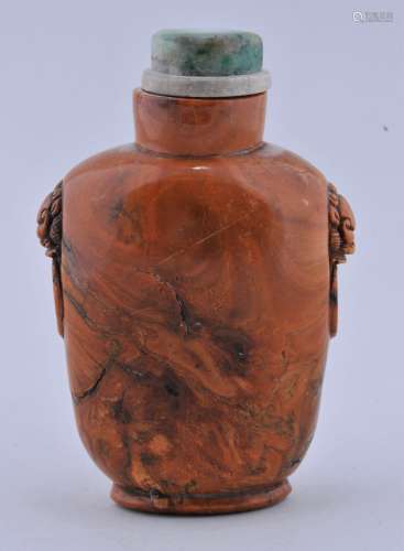 Root amber Snuff bottle. China. 19th century. Lion mask handles. Jade stopper. 3