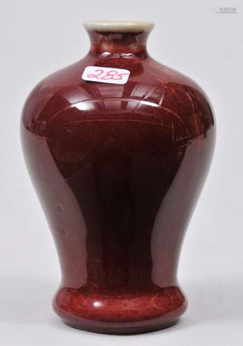 Small porcelain vase. China. 19th century Mei Ping form. Lang Yao glaze of a purplish red. 3-1/2