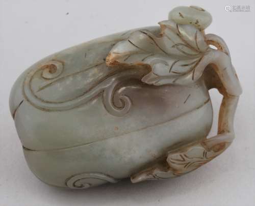 Jade snuff bottle. China. 19th century. Grey jade. Carved as a melon with foliage. 2-1/2