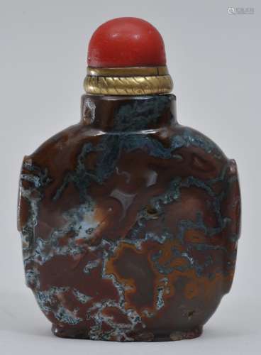 Snuff  bottle. China. 19th century. Red and green moss agate. Coral glass stopper set in brass. 2-3/4
