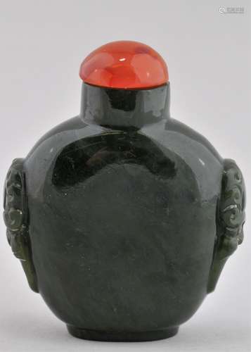 Jade Snuff bottle. Dark forest green colour. Lion mask handles. 2-1/4