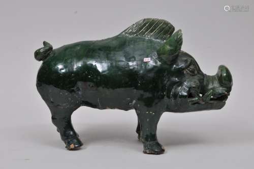 Pottery animal. China. Han style. Study of a green glazed boar. 16
