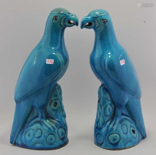 Pair of stoneware parrots. China. 19th century. Deep turquoise glaze. 9-1/2