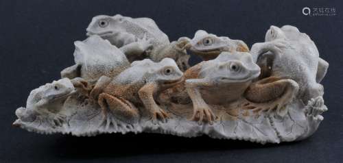 Mastodon Ivory carving. 20th century. Study of seven frogs on leaves.  4-1/2