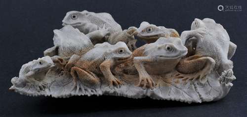 Mastodon Ivory carving. 20th century. Study of seven frogs on leaves. 4-1/2