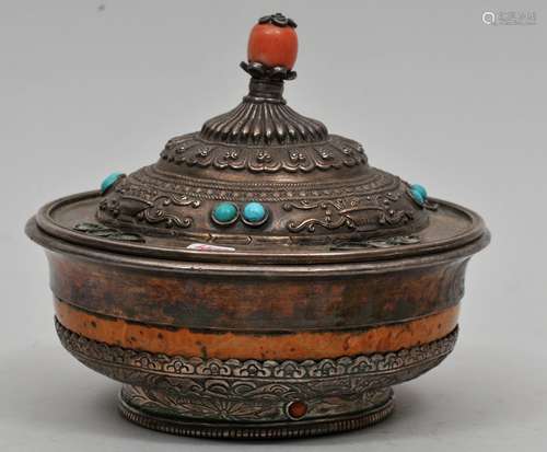 Burlwood tea bowl. Tibet. 19th to early 20th century. Repousse silver mounts set with coral and turquoise. 5