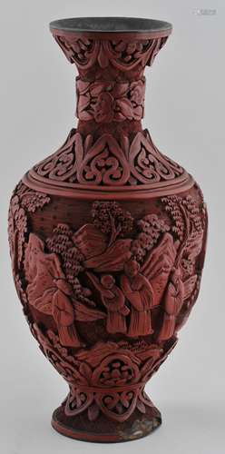 Carved cinnabar vase. China. Early 20th century. Decoration of figures in a landscape. 9