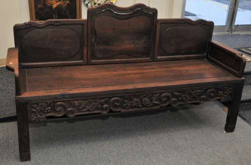 Rosewood couch. China. 19th century. Surfaces carved with raised panels. 77-3/4