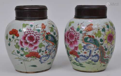Pair of porcelain jars. China. 19th century. Famille Rose decoration of phoenixes and flowers. 7-1/2