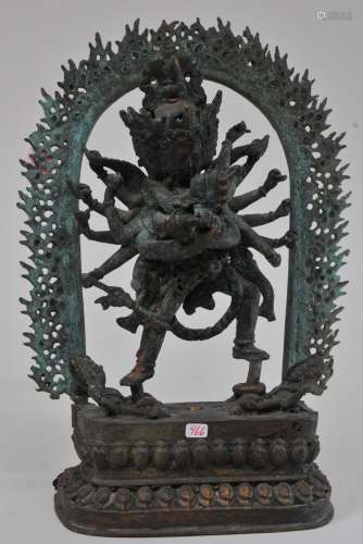Bronze Buddhist Image. Nepal. 19th century. A standing figure of Chakrasamvara in yab yum. 9-1/2