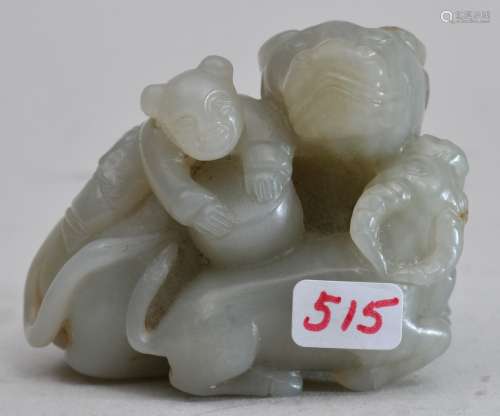 Jade carving. China. 20th century. Grey stone. Carving of a water buffalo, calf and a child. 2-1/2
