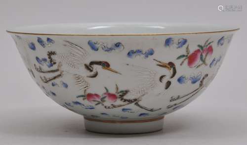 Porcelain bowl. China. Kuang Hsu mark and possibly of the period. Famille Rose decoration of peaches, clouds and cranes. 5-1/4