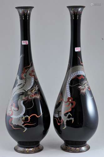 Pair of Cloisonné vases. Japan. Meiji period. (1868-1912). Silver wire work of dragons on a midnight blue ground. 12