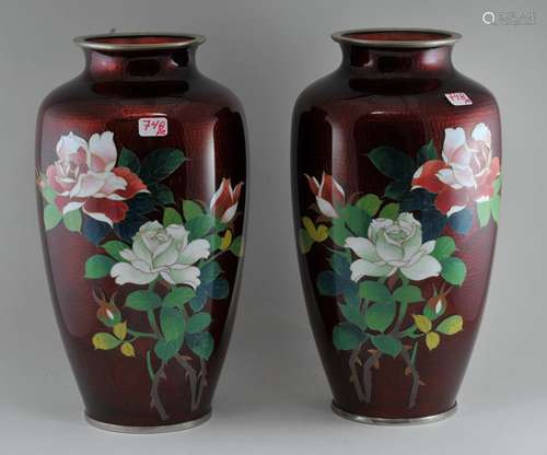 Pair of Cloisonné vases. Japan. Early 20th century. Bas Taille (Tsuiki Jippo). Ruby ground with standard cloisonné roses. 7-1/2