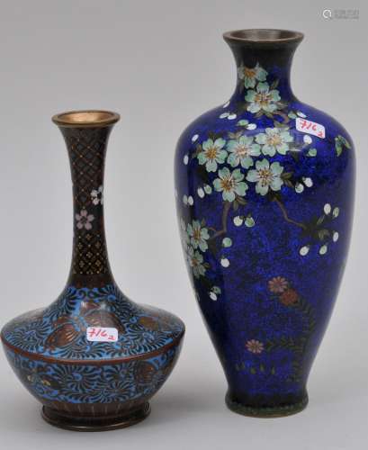 Lot of two Cloisonné vases. Japan. Meiji period. To include a vase with butterflies and flowers. The other - a flowering tree on a blue bas taille ground. 5-1/4