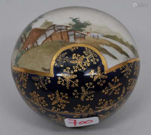 Small round pottery box. Japan. Meiji period (1868-1912). Decoration of rustic cottages on a gilded cobalt blue ground. Interior decorated with tea ceremony utensils. Signed Kinkozan. 2