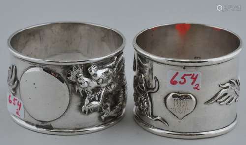 Two Chinese Export Silver napkin rings. Dragon decoration.