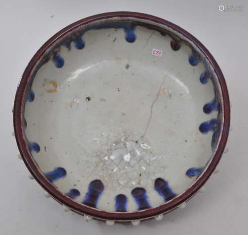 Porcelain bowl. China. 19th century. Lang Yao glaze of purple red and blue. Hobnail decoration at the mouth and foot. 10