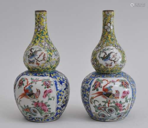 Pair of porcelain vases. China. 19th century. Double gourd form. Decoration of birds and flowers. 6-3/4