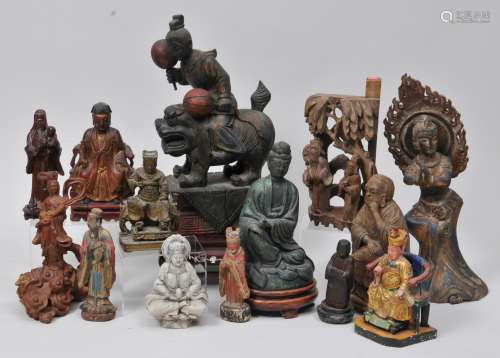 Lot of 13. Wood carvings, China. 19th-20th century. To include a stand and various figures of deity and a bronze Kuan Yin. Largest 16
