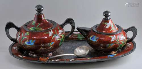 Cream and sugar set with tray and spoon. Korea. 20th century. Enameled silver. Decoration of ducks and lotus plants on an amber coloured ground. Tray- 9-1/2