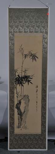 Hanging scroll. Japan. 19th century. Ink on paper. Babmoo and a scholars rock. 46-1/2