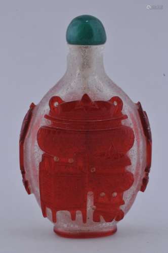 Cameo glass Snuff bottle. Overlay of red cut to snowflake. Pattern of the nine cauldrens of chou. 2-3/4