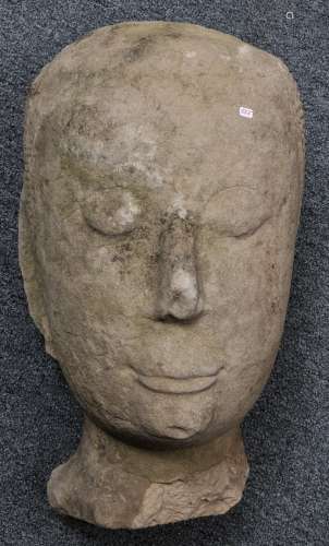 Carved sandstone head. Thailand. 15th century Ayuthaya period. Image of The Buddha. 18