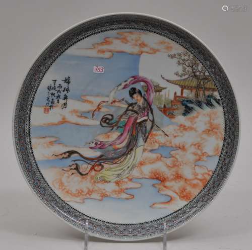 Porcelain plate. China. Mid 20th century. Famille Rose decoration of an Immortal. 10-3/4