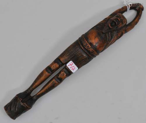 Carved wooden pipe case. Japan. 19th century. Man yawning and stretching. 8-1/4