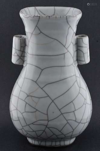 Kuan Yao vase. China. 20th century. Hu form. Pale blue-celadon grain with pronounced crab claw crackle. 10