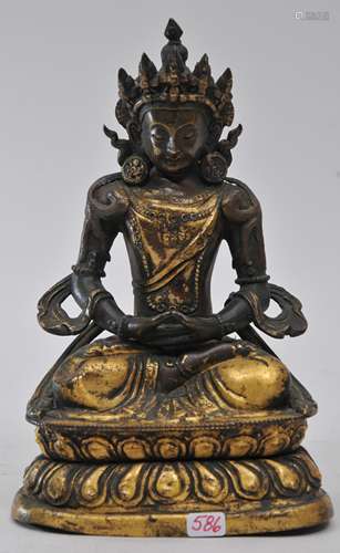 Repousse copper Buddha. China. 19th century. Gilt surface. Figure of Amytans. Crack to front. 7-1/2